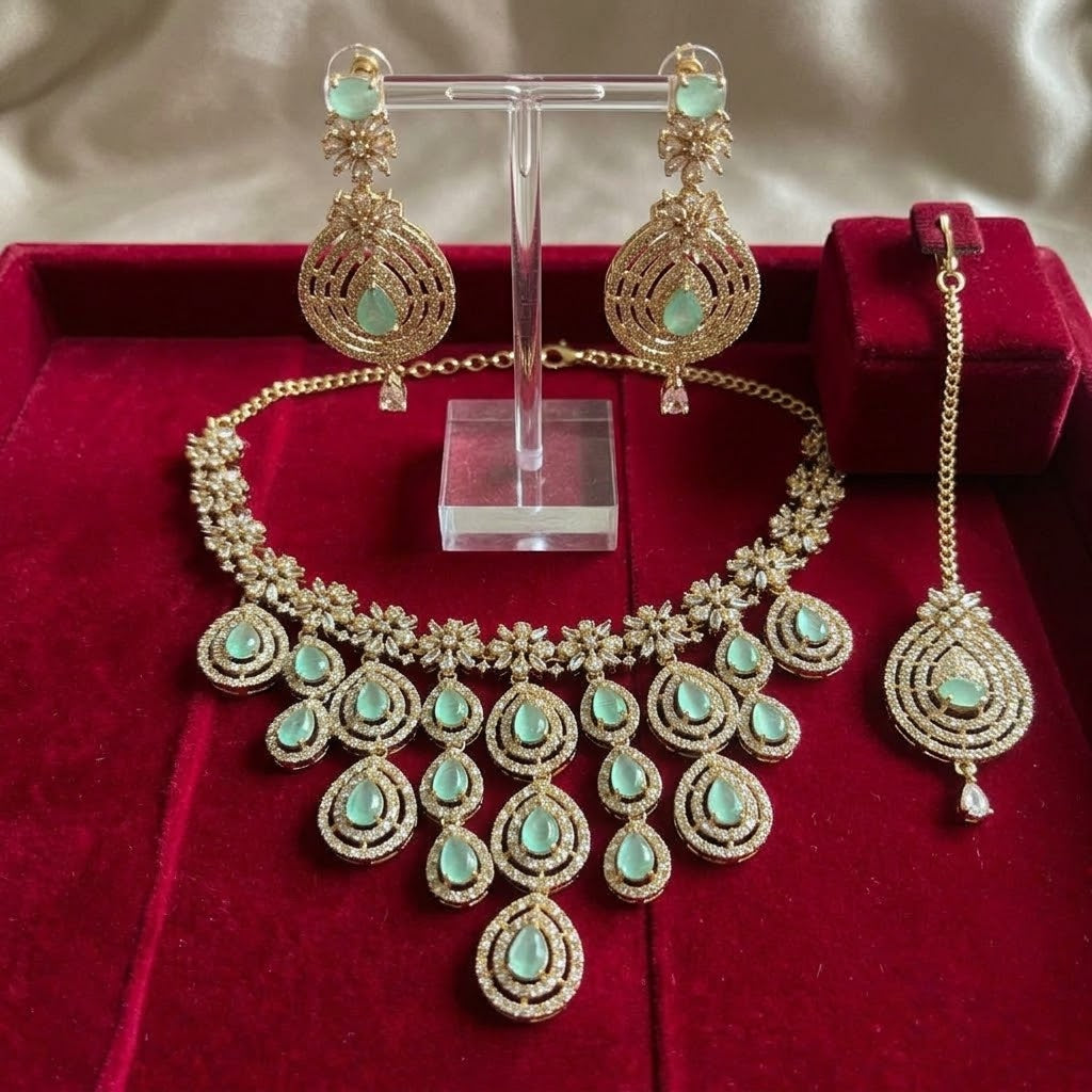 This is an American Diamond (AD) and cubic zirconia (CZ) bridal choker necklace set featuring White gemstone accents and matching drop earrings