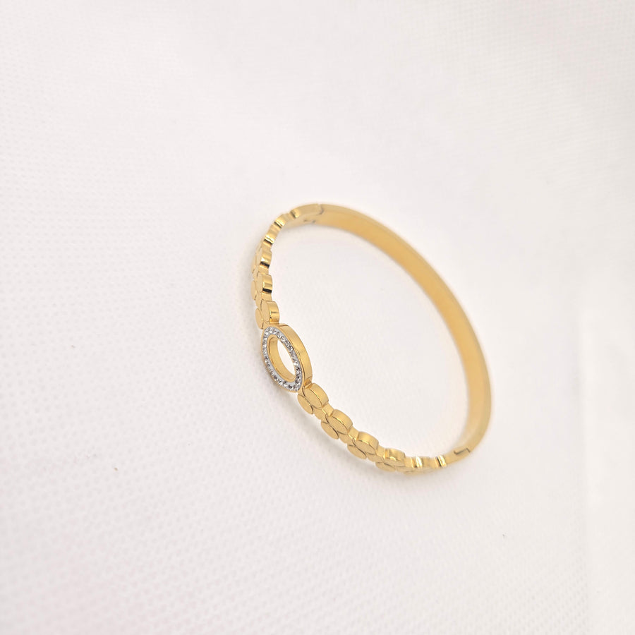 Gold-Toned Oval Openwork Bangle with Clear Accents